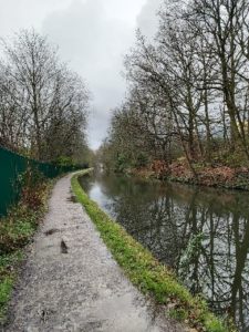 Image of a canal path with grey skies 