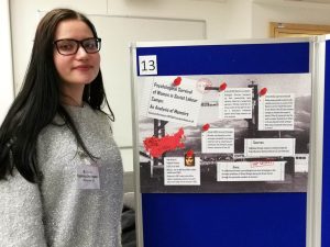 Kseniya presenting a poster based on her research at the School of History and Cultures Dissertation Poster Showcase in January 2018