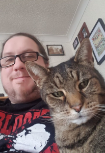 Craig Crowe and his tabby cat