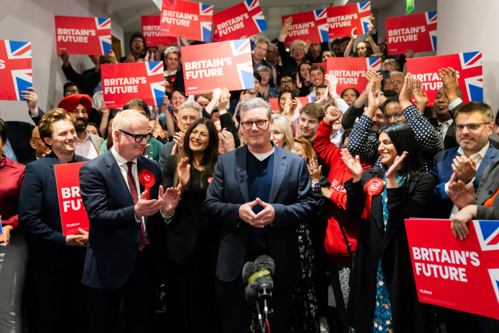 Keir Starmer, leader of the Labour Party, and Richard Parker, Labour’s newly elected West Midlands Mayor, celebrate with activists at the ICC in Birmingham. Picture date: Saturday May 4, 2024