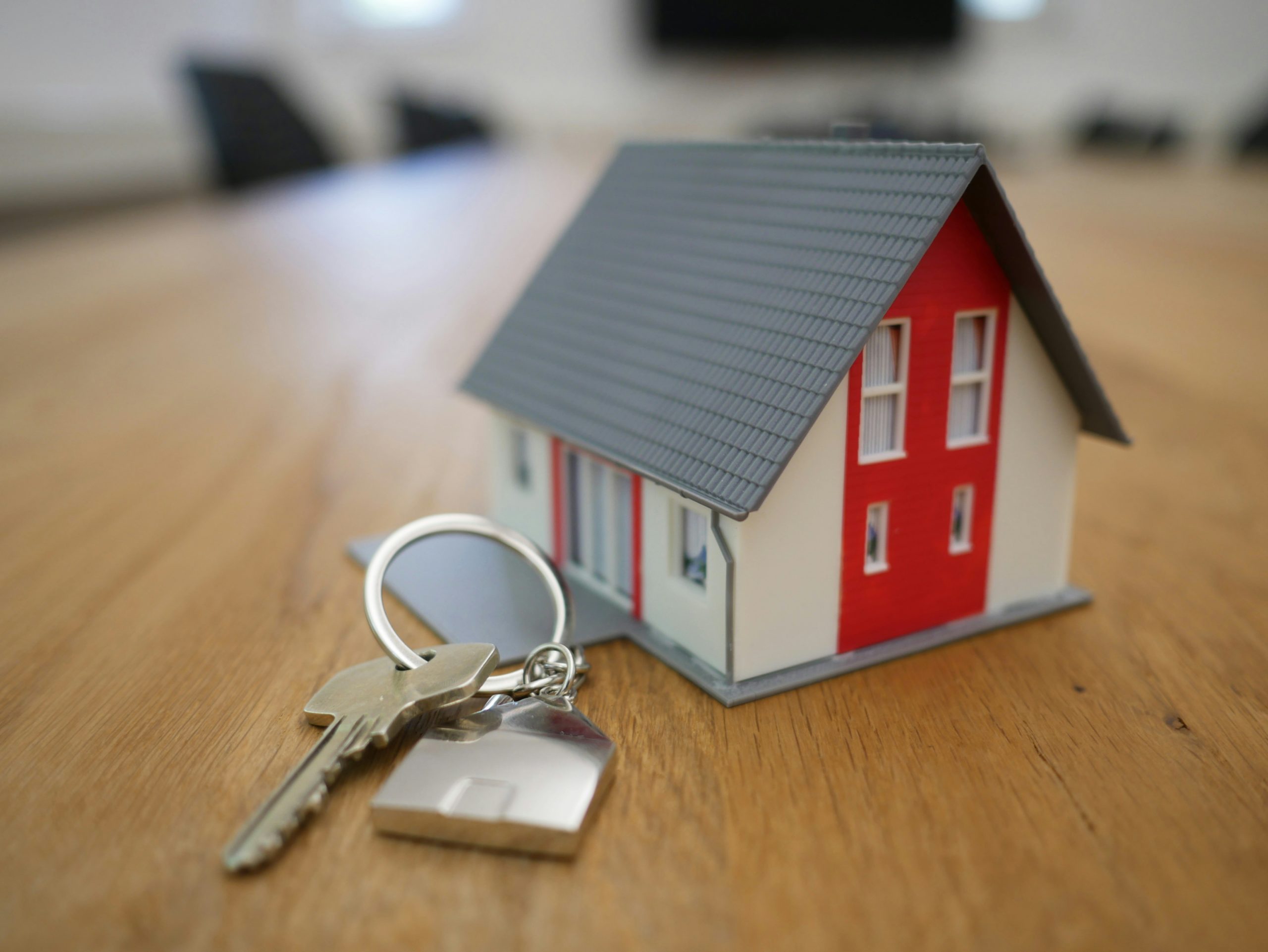 A key and a small model of a house