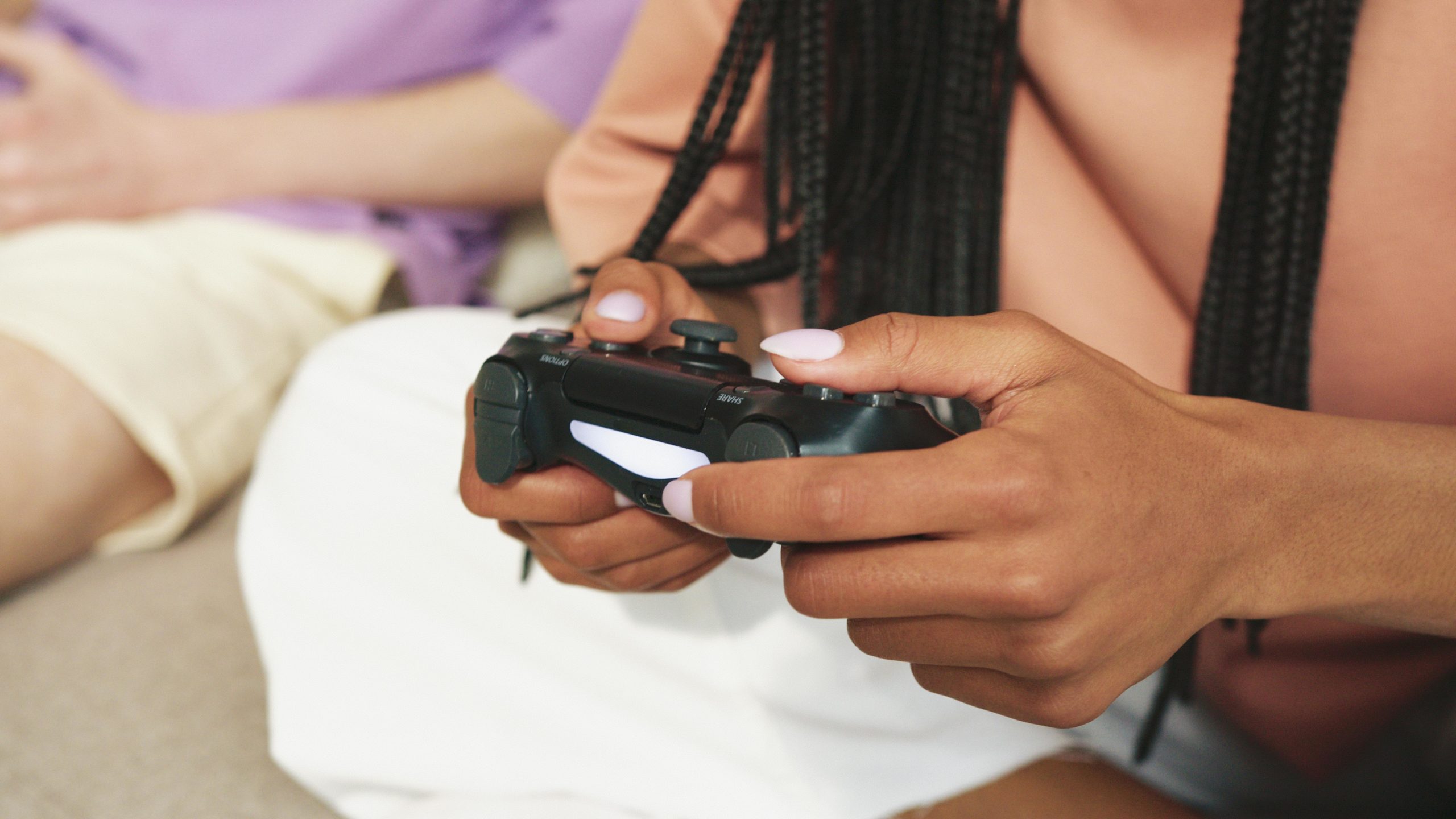 Person holding a video game controller