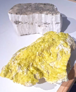 Photo of a piece of yellow sulfate mineral rock 