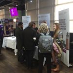 Lots of people crowded around the UoB stand at the Apprenticehsips Fair
